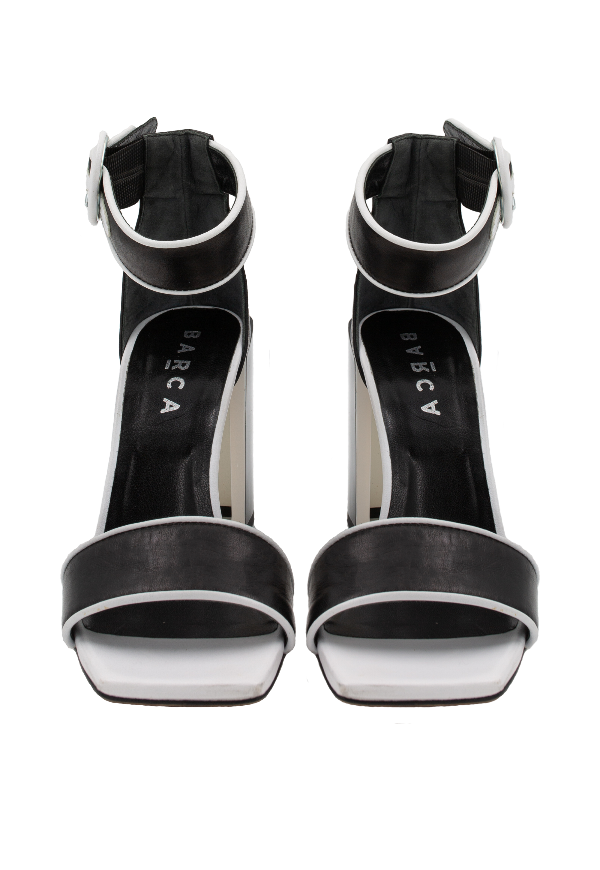 Black sandals with white trim