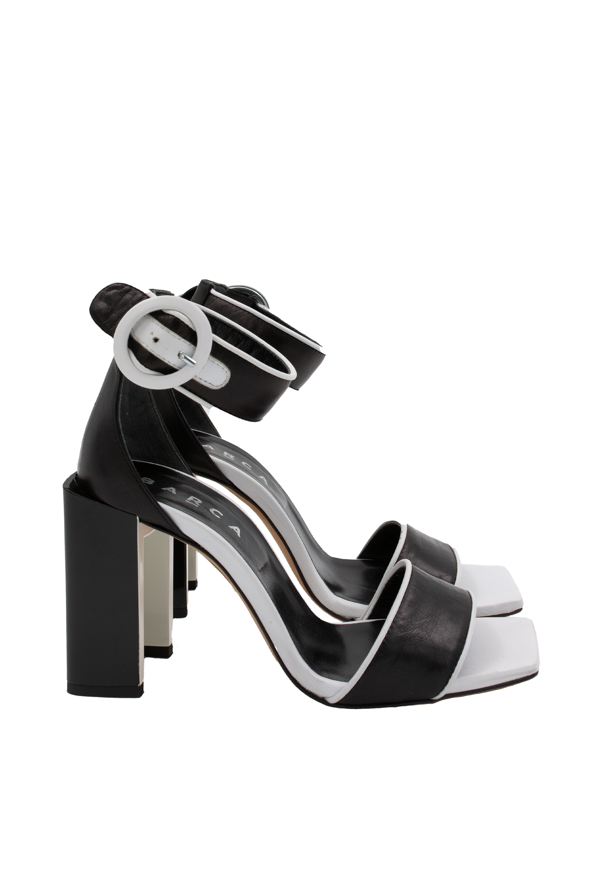 Black sandals with white trim