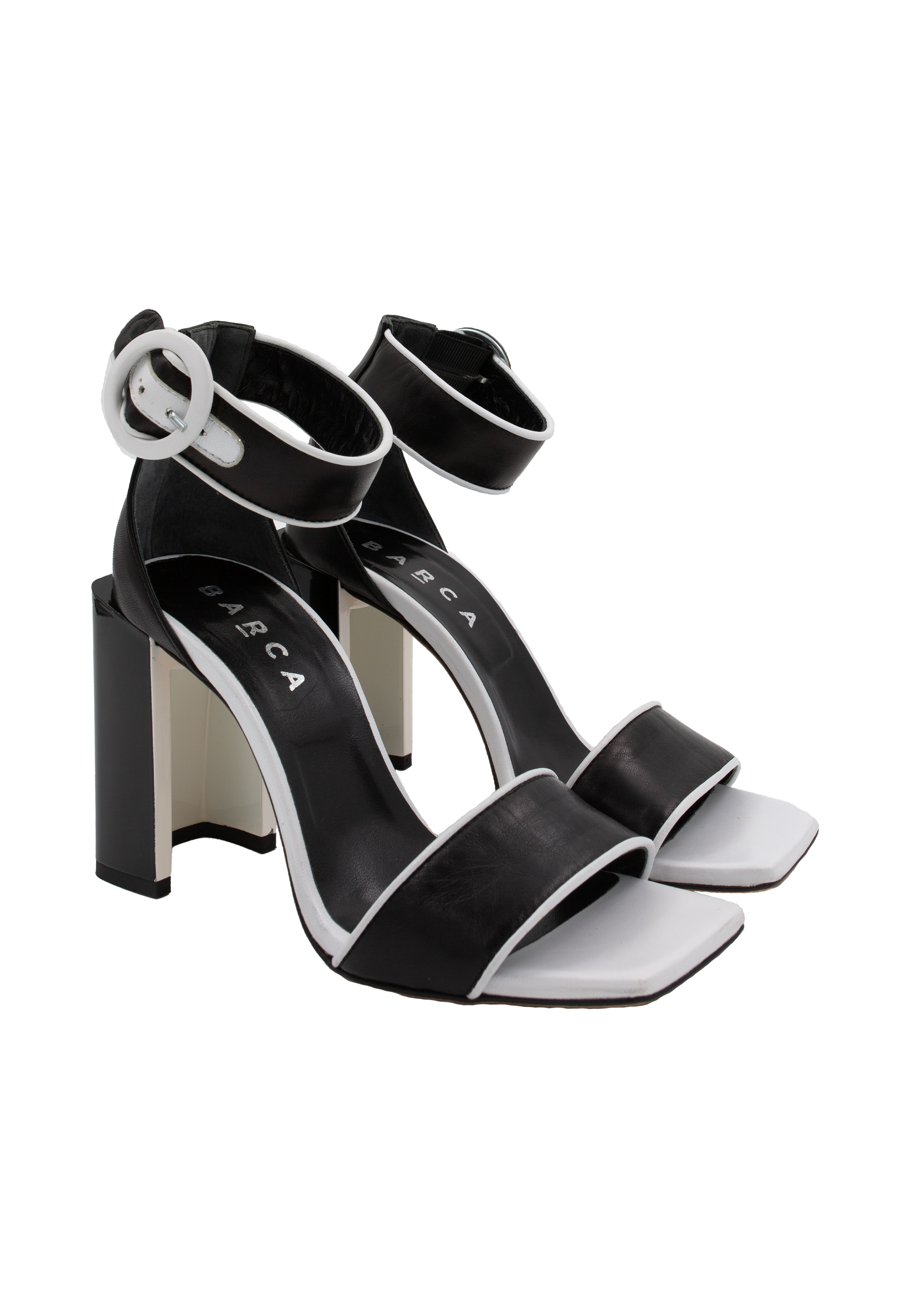 Black sandals with white trim