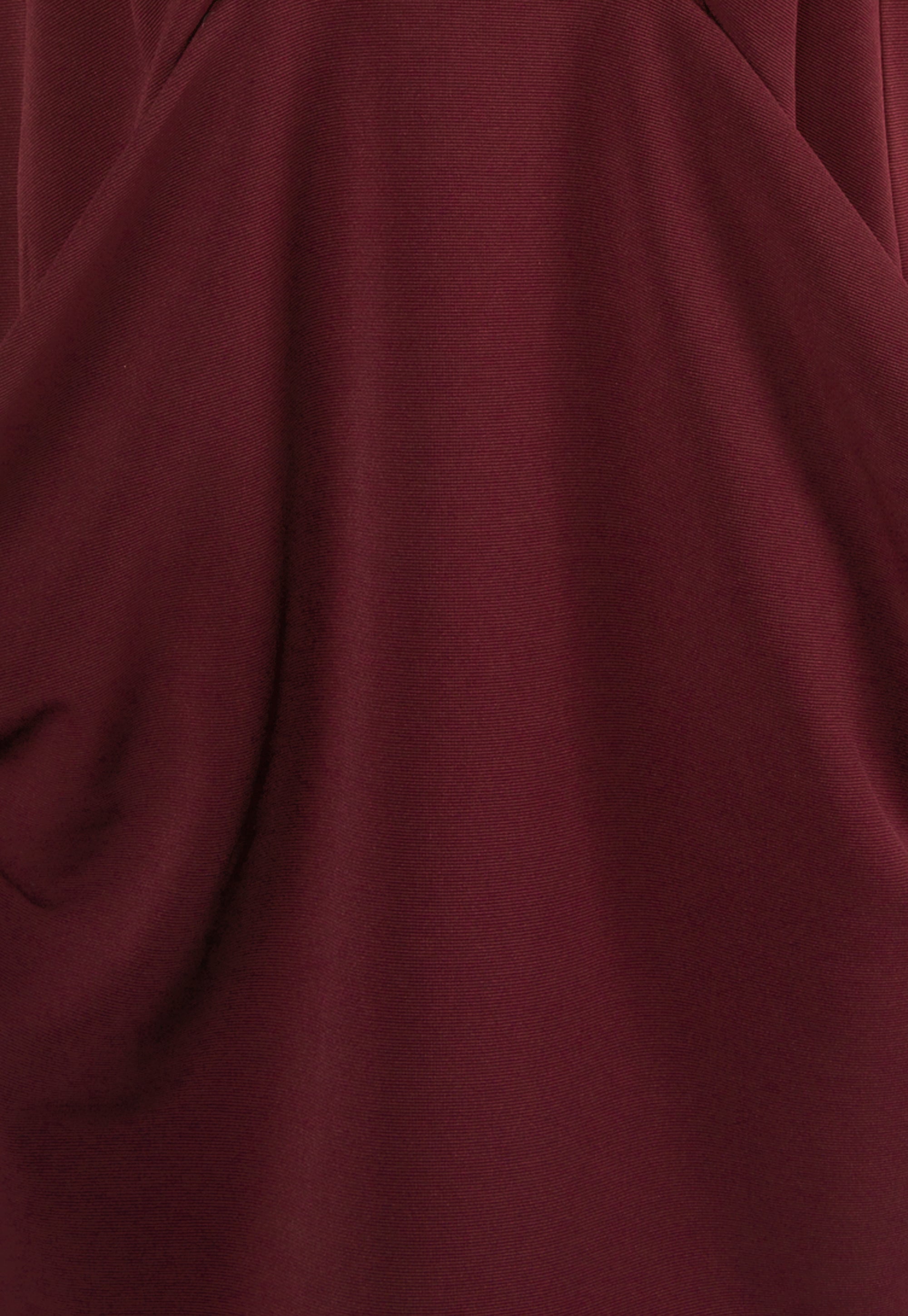 Burgundy dress with decorative pockets